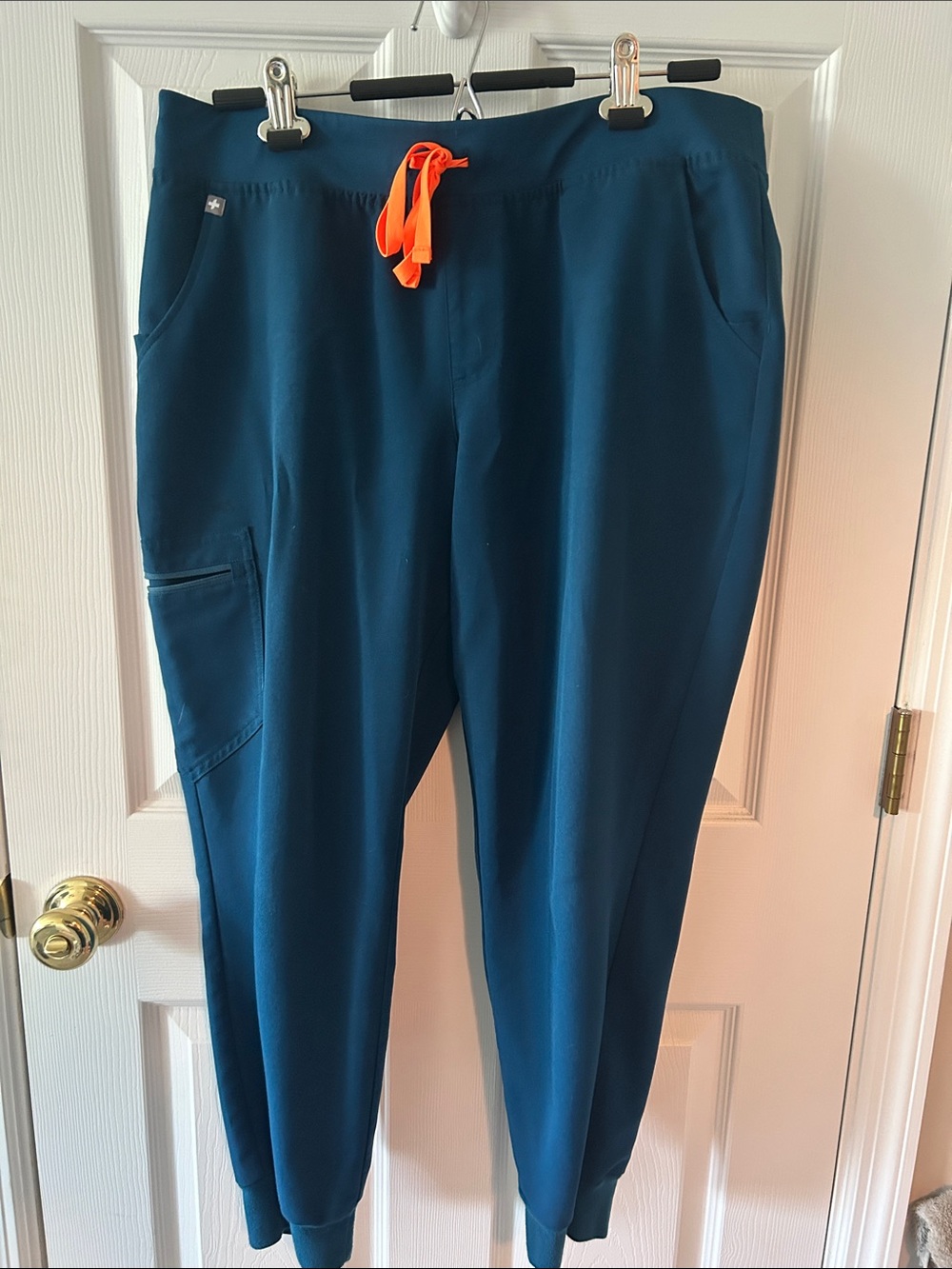 FIGS Women’s Teal Scrub Jogger Pants and Top with Orange Drawstring